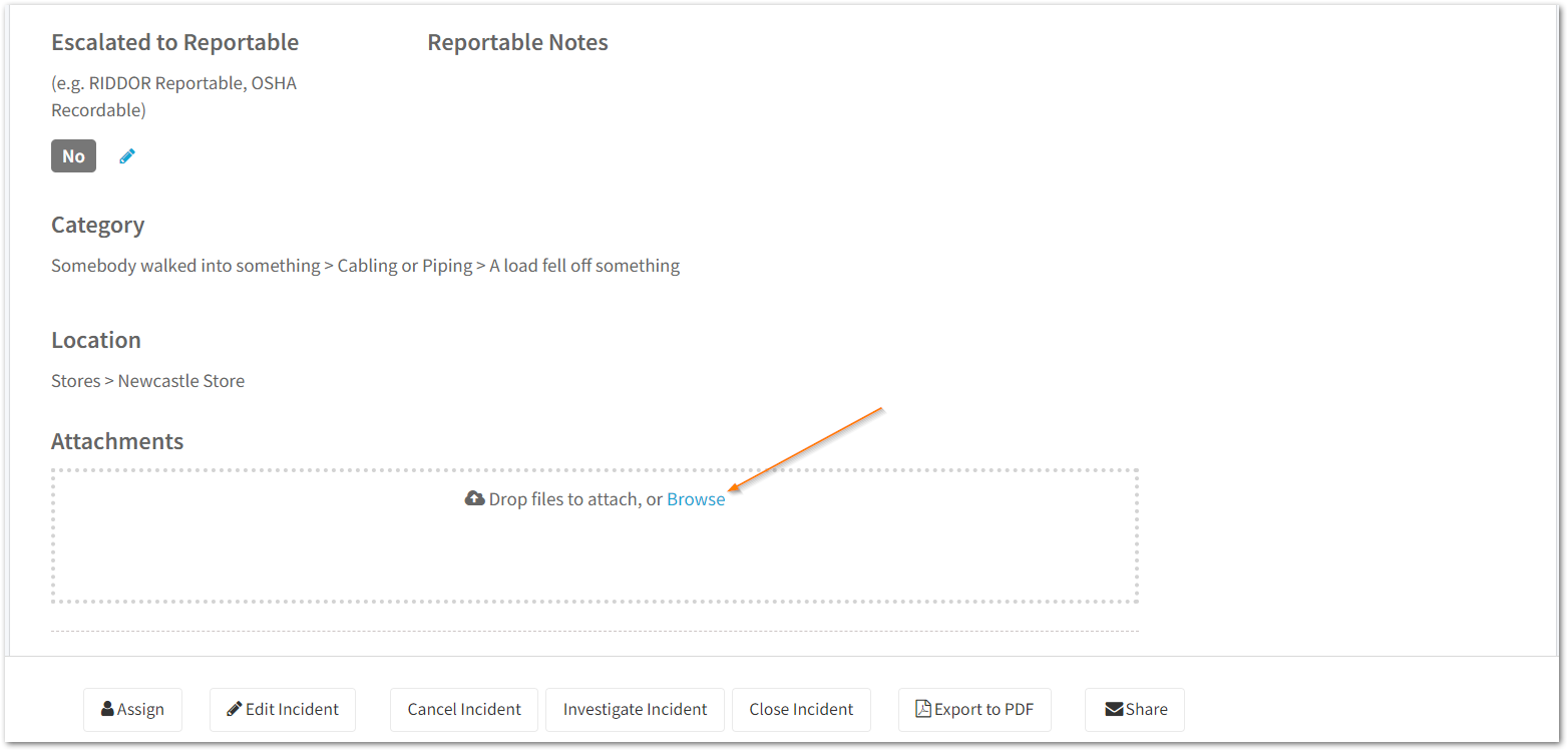 How do I attach a file to an incident report?